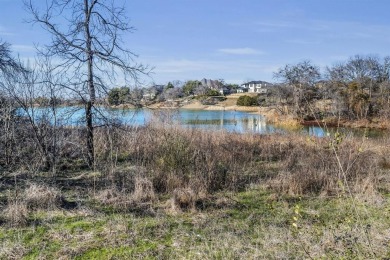 This unique waterfront property in the Lake Ridge community of on Tangle Ridge Golf Club in Texas - for sale on GolfHomes.com, golf home, golf lot