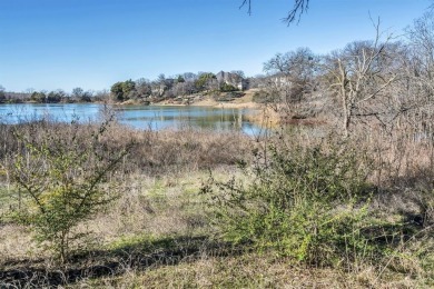 This unique waterfront property in the Lake Ridge community of on Tangle Ridge Golf Club in Texas - for sale on GolfHomes.com, golf home, golf lot