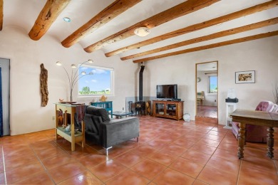 Authentic Adobe - Experience the charm and craftsmanship of true on Taos Country Club in New Mexico - for sale on GolfHomes.com, golf home, golf lot