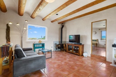 Authentic Adobe - Experience the charm and craftsmanship of true on Taos Country Club in New Mexico - for sale on GolfHomes.com, golf home, golf lot