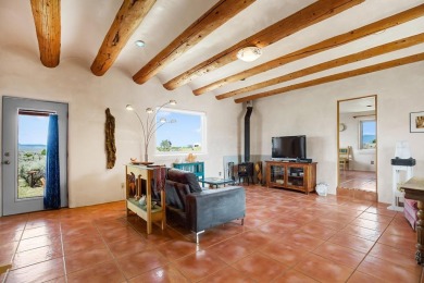 Authentic Adobe - Experience the charm and craftsmanship of true on Taos Country Club in New Mexico - for sale on GolfHomes.com, golf home, golf lot