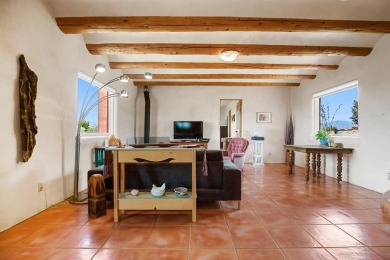 Authentic Adobe - Experience the charm and craftsmanship of true on Taos Country Club in New Mexico - for sale on GolfHomes.com, golf home, golf lot
