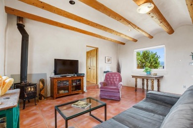 Authentic Adobe - Experience the charm and craftsmanship of true on Taos Country Club in New Mexico - for sale on GolfHomes.com, golf home, golf lot