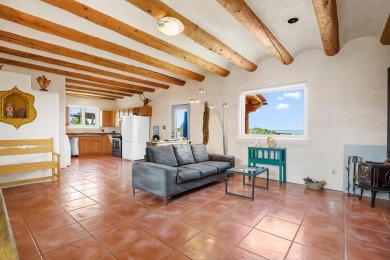 Authentic Adobe - Experience the charm and craftsmanship of true on Taos Country Club in New Mexico - for sale on GolfHomes.com, golf home, golf lot