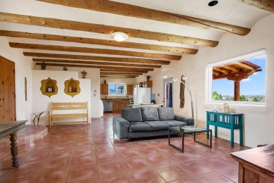 Authentic Adobe - Experience the charm and craftsmanship of true on Taos Country Club in New Mexico - for sale on GolfHomes.com, golf home, golf lot