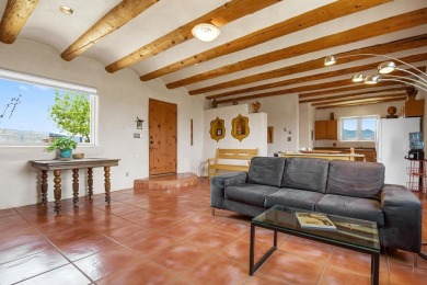Authentic Adobe - Experience the charm and craftsmanship of true on Taos Country Club in New Mexico - for sale on GolfHomes.com, golf home, golf lot