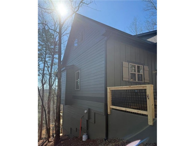 Welcome to this custom-built modern craftsman cabin nestled on White Path Golf Club in Georgia - for sale on GolfHomes.com, golf home, golf lot