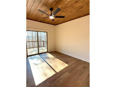 Welcome to this custom-built modern craftsman cabin nestled on White Path Golf Club in Georgia - for sale on GolfHomes.com, golf home, golf lot