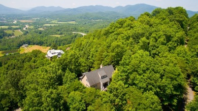 Experience serene living with panoramic mountain and golf course on Brasstown Valley Resort and Spa in Georgia - for sale on GolfHomes.com, golf home, golf lot