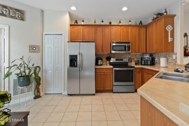 This 2006 home, presented in move-in-ready condition, offers on LPGA International Golf Course in Florida - for sale on GolfHomes.com, golf home, golf lot