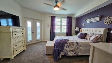 MOTIVATED SELLER - PRICE IMPROVED! TOP-FLOOR W/GARAGE NOW on East Bay Golf Club in Florida - for sale on GolfHomes.com, golf home, golf lot