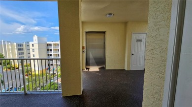 MOTIVATED SELLER - PRICE IMPROVED! TOP-FLOOR W/GARAGE NOW on East Bay Golf Club in Florida - for sale on GolfHomes.com, golf home, golf lot