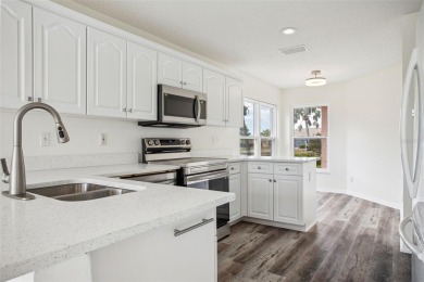 Welcome to your serene lakefront retreat in the heart of Sun on Sandpiper Golf Club in Florida - for sale on GolfHomes.com, golf home, golf lot