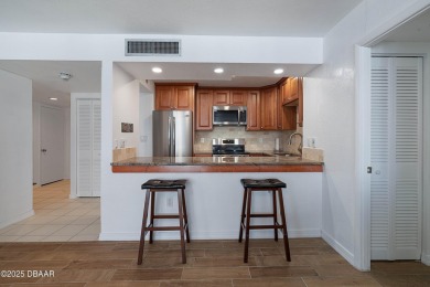Indulge in the ultimate beach lifestyle in this 2/2 condo with on Oceans Golf Club in Florida - for sale on GolfHomes.com, golf home, golf lot