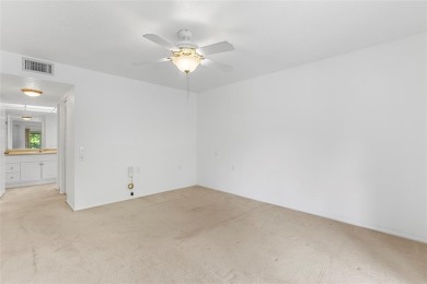 Welcome to this charming and spacious 2nd-floor condo located in on Wynmoor Golf Course in Florida - for sale on GolfHomes.com, golf home, golf lot