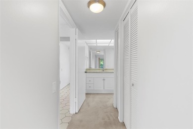 Welcome to this charming and spacious 2nd-floor condo located in on Wynmoor Golf Course in Florida - for sale on GolfHomes.com, golf home, golf lot