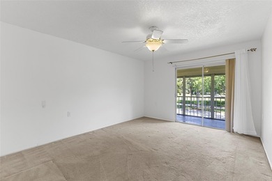 Welcome to this charming and spacious 2nd-floor condo located in on Wynmoor Golf Course in Florida - for sale on GolfHomes.com, golf home, golf lot