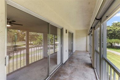 Welcome to this charming and spacious 2nd-floor condo located in on Wynmoor Golf Course in Florida - for sale on GolfHomes.com, golf home, golf lot