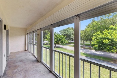 Welcome to this charming and spacious 2nd-floor condo located in on Wynmoor Golf Course in Florida - for sale on GolfHomes.com, golf home, golf lot