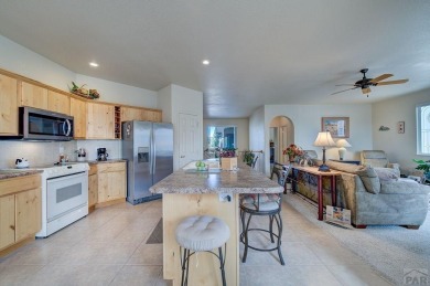 Right on golf course!  You'll LOVE the location and quality of on Desert Hawk At Pueblo West in Colorado - for sale on GolfHomes.com, golf home, golf lot
