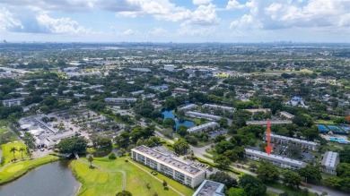 Welcome to this charming and spacious 2nd-floor condo located in on Wynmoor Golf Course in Florida - for sale on GolfHomes.com, golf home, golf lot