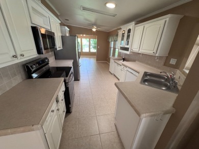 Charming 2 Bed / 2 Bath Home in Premier Golf Course Community on Crane Lakes Golf and Country Club in Florida - for sale on GolfHomes.com, golf home, golf lot