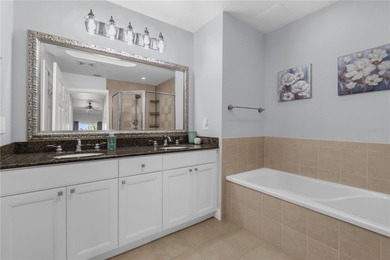 Under contract-accepting backup offers. Tastefully updated on Reunion Resort Golf Course in Florida - for sale on GolfHomes.com, golf home, golf lot