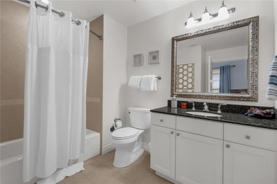 Under contract-accepting backup offers. Tastefully updated on Reunion Resort Golf Course in Florida - for sale on GolfHomes.com, golf home, golf lot