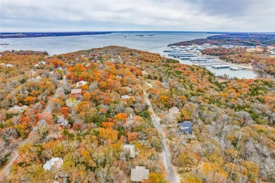 Nestled near the shores and vibrant community of Lake Texoma on Tanglewood Resort in Texas - for sale on GolfHomes.com, golf home, golf lot