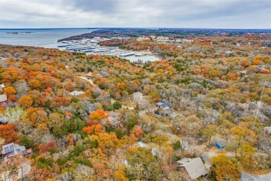 Nestled near the shores and vibrant community of Lake Texoma on Tanglewood Resort in Texas - for sale on GolfHomes.com, golf home, golf lot