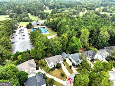 Welcome home to an oasis not too far from the city. Quiet 13 on Canongate At Flat Creek Club in Georgia - for sale on GolfHomes.com, golf home, golf lot