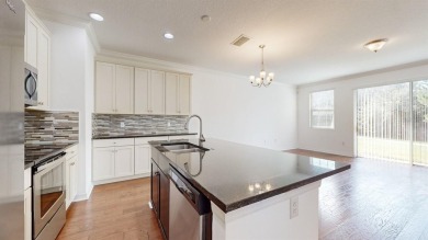 Don't miss this rare opportunity to own a breathtaking townhome on Eagle Creek Golf Club in Florida - for sale on GolfHomes.com, golf home, golf lot