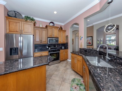 Luxurious country club living with premium water and golf views on Venetian Golf and River Club in Florida - for sale on GolfHomes.com, golf home, golf lot