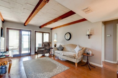 Enjoy easy living in this comfortable, upgraded 2 bed/2 bath on The Club At Pelican Bay - North Course in Florida - for sale on GolfHomes.com, golf home, golf lot