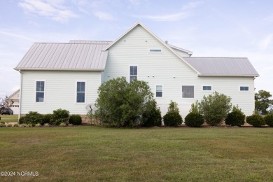 Custom-built in Occano, a waterfront community on the Inner on Occano Golf Course in North Carolina - for sale on GolfHomes.com, golf home, golf lot