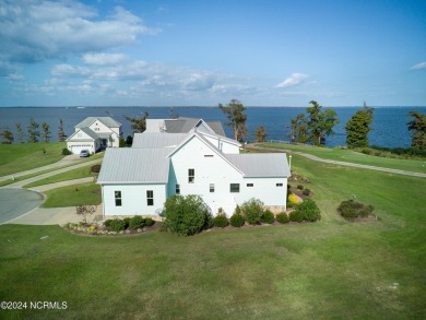 Custom-built in Occano, a waterfront community on the Inner on Occano Golf Course in North Carolina - for sale on GolfHomes.com, golf home, golf lot