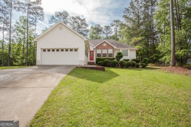 Welcome home to peaceful living in this well maintained 3 Br/2 on Fairfield Plantation Golf and Country Club in Georgia - for sale on GolfHomes.com, golf home, golf lot