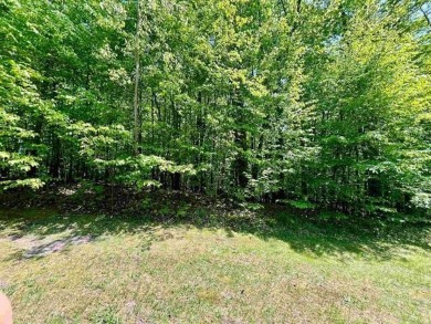 Beautiful spacious lot, on Forest Highlands, nestled in the on Cedar River Golf Course in Michigan - for sale on GolfHomes.com, golf home, golf lot