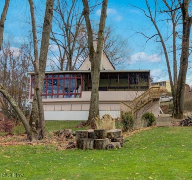 Welcome to an amazing opportunity at Lake Mohawk-This charming on Lake Mohawk Golf Club in Ohio - for sale on GolfHomes.com, golf home, golf lot