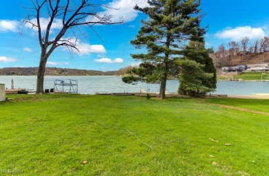 Welcome to an amazing opportunity at Lake Mohawk-This charming on Lake Mohawk Golf Club in Ohio - for sale on GolfHomes.com, golf home, golf lot