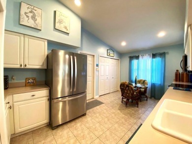 Welcome to highly sought-after Kings Gate, a secure and friendly on Kings Gate Golf Club in Florida - for sale on GolfHomes.com, golf home, golf lot
