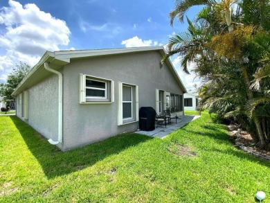 Welcome to highly sought-after Kings Gate, a secure and friendly on Kings Gate Golf Club in Florida - for sale on GolfHomes.com, golf home, golf lot