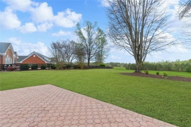 This stunning single-story brick ranch home offers sweeping on Gold Creek Resort in Georgia - for sale on GolfHomes.com, golf home, golf lot