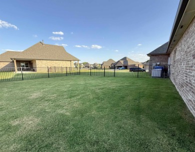 This beautifully maintained one-owner home sits in a desirable on Pheasant Run in Oklahoma - for sale on GolfHomes.com, golf home, golf lot