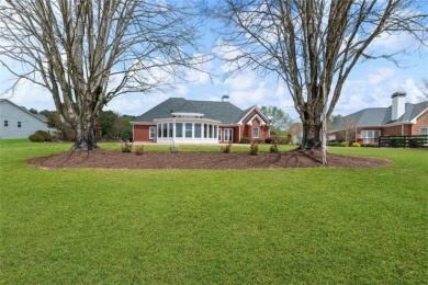This stunning single-story brick ranch home offers sweeping on Gold Creek Resort in Georgia - for sale on GolfHomes.com, golf home, golf lot