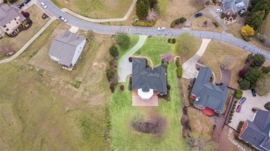 This stunning single-story brick ranch home offers sweeping on Gold Creek Resort in Georgia - for sale on GolfHomes.com, golf home, golf lot