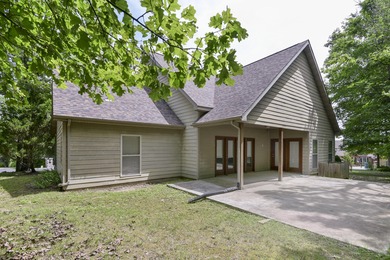 Charming home in this beautiful golf course community. there is on Ledgestone Country Club and Golf Course in Missouri - for sale on GolfHomes.com, golf home, golf lot