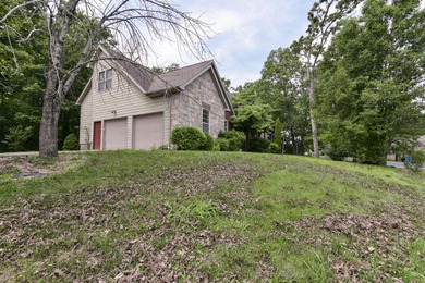 Charming home in this beautiful golf course community. there is on Ledgestone Country Club and Golf Course in Missouri - for sale on GolfHomes.com, golf home, golf lot