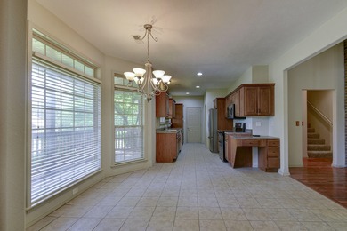 Charming home in this beautiful golf course community. there is on Ledgestone Country Club and Golf Course in Missouri - for sale on GolfHomes.com, golf home, golf lot