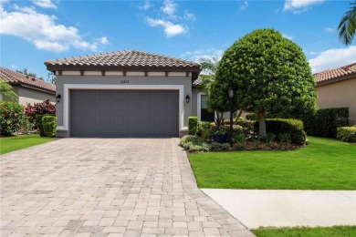 PRICE REDUCTION! Welcome to this stunning 2-bedroom, 2-bathroom on Esplanade Golf and Country at Lakewood Ranch in Florida - for sale on GolfHomes.com, golf home, golf lot